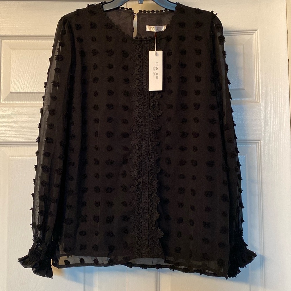 Black blouse with puffed dots